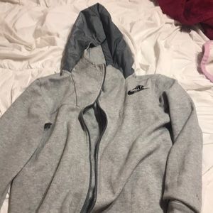 A gray Nike sweater